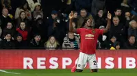 Pemain Manchester United Odion Ighalo melakukan selebrasi usai mencetak gol ke gawang Derby County pada pertandingan putaran kelima Piala FA di Pride Park, Derby, Inggris, Kamis (5/3/2020). Manchester United menang dengan skor 3-0. (AP Photo/Rui Vieira)