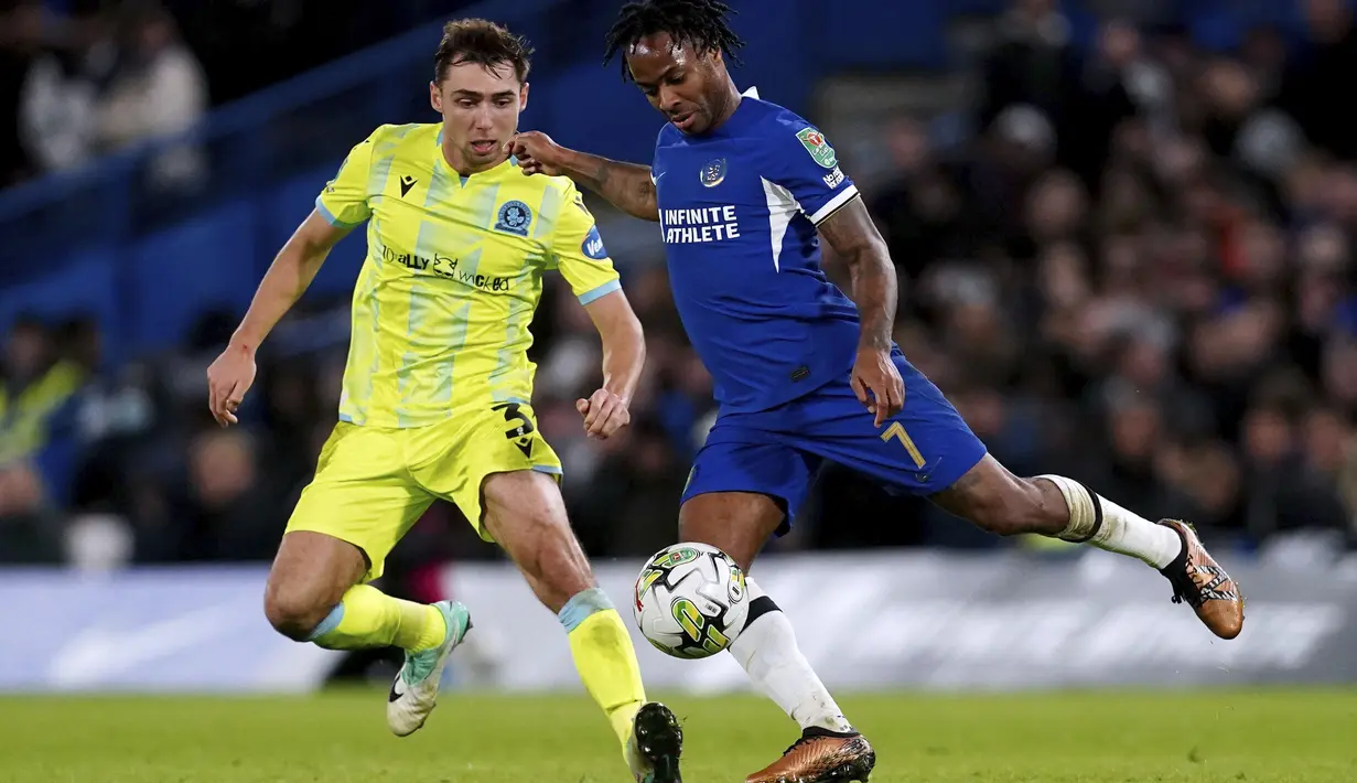 Raheem Sterling (59’) menggandakan keunggulan Chelsea lewat placing berkelas. (Nick Potts/PA via AP)