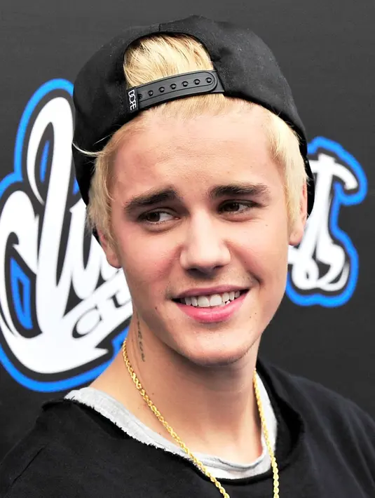 Foto ini diambil pada Desember 2014 saat Justin Bieber sudah keluar dari beberapa masalah hukum. Ia pun mengecat rambutnya menjadi platinum blond. (Jerod Harris/Getty/USMagazine)
