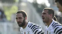 Selebrasi Gonzalo Higuain usai menjadi pahlawan kemenangan 2-0 Juventus atas Pescara. (ANDREAS SOLARO / AFP)