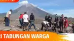 Sejumlah warga dibantu oleh petugas untuk mencari tabungannya yang telah tertimbun abu vulkanik. Besar harapan mereka dapat menemukan uang simpanannya tersebut demi menyambung hidup.