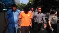 Dodik Ikhwanto tersangka ujaran kebencian terhadap Ibu Negara Iriana Joko Widodo. (Liputan6.com/Aditya Prakasa)