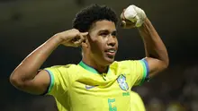 Selebrasi pemain Timnas Brasil U-20, Andrey Santos setelah menjebol gawang Timnas Venezuela U-20 pada laga Piala Amerika Selatan U-20 di Metropolitano de Techo Stadium, Bogota, Kolombia (3/2/2023). Gelandang tengah berusia 18 tahun yang sejak Januari 2023 menjadi milik Chelsea ini memiliki nilai pasar 12 juta euro atau setara hampir Rp198 miliar. Bersama Timnas Brasil U-20 ia telah mengoleksi 11 caps dengan torehan 6 gol dan 2 assist sejak debut pada 11 Juni 2022. (AFP/Juan Pablo Pino)