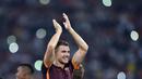 Pemain AS Roma, Edin Dzeko, merayakan kemenangan atas Juventus. Edin Dzeko menyumbang satu gol dalam partai di Stadion Olimpico, Roma, Italia. Minggu (30/8/2015). (Reuters/Alberto Lingria)