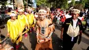 Perwakilan pelajar dan mahasiswa Papua mengikuti Kirab Kebangsaan Indonesia Raya di Cibinong, Kab Bogor, Minggu (14/5). Kirab diikuti puluhan organisasi kepemudaan se Kabupaten Bogor. (Liputan6.com/Helmi Fithriansyah)