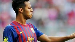Ekspresi bintang muda Barcelona Thiago Alcantara ketika menghadapi Internacional di ajang Audi Cup di Munich, Jerman, 26 Juli 2011. AFP PHOTO/CHRISTOF STACHE