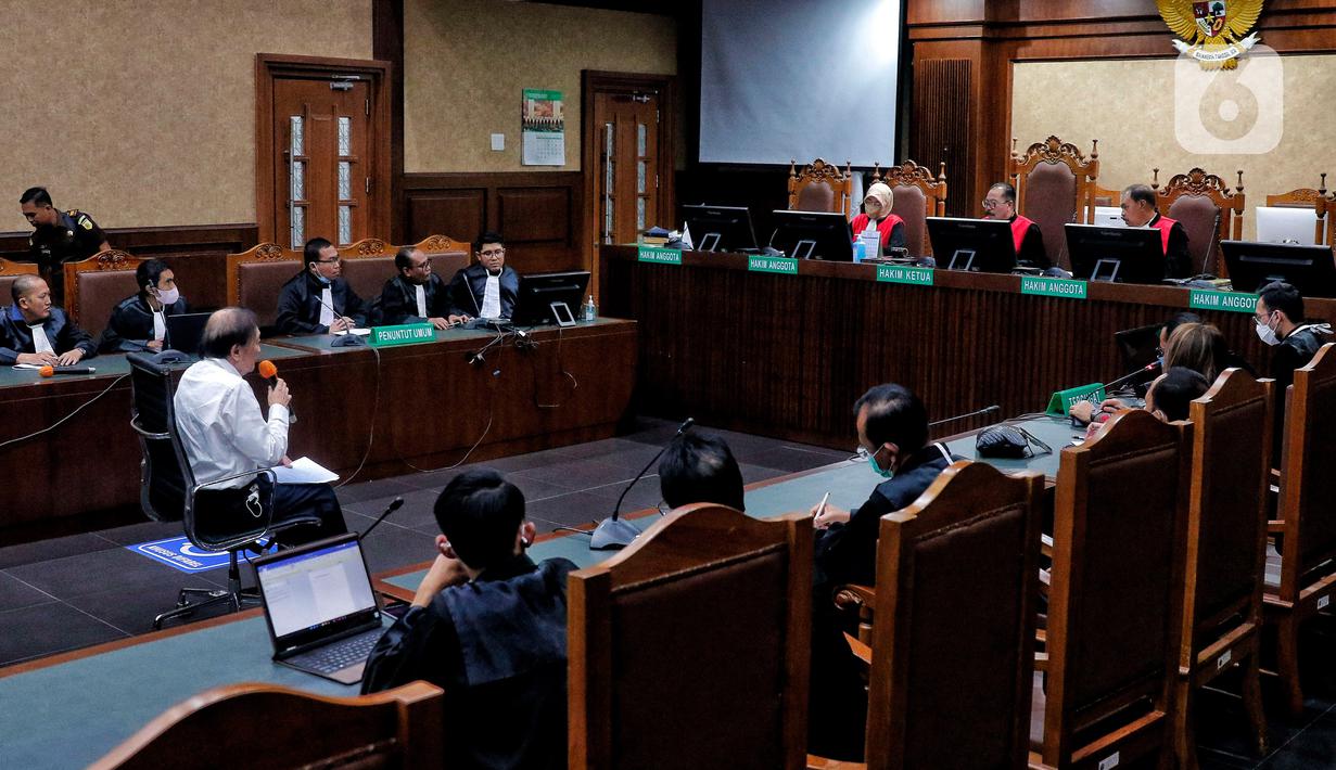 Terdakwa kasus dugaan tindak pidana korupsi PT Duta Palma, Surya Darmadi mengikuti sidang pembacaan putusan di Pengadilan Tipikor Jakarta, Kamis (23/2/2023). Hakim menyatakan Surya Darmadi terbukti bersalah telah merugikan keuangan negara senilai Rp 2,64 triliun. (Liputan6.com/Angga Yuniar)