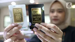 Menurut informasi dari laman logammulia.com, harga emas Antam hari ini (12/9/2024) mencapai Rp1.409.000 per gram, turun dari sebelumnya Rp1.411.000 per gram. (Liputan6.com/Angga Yuniar)