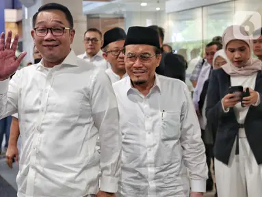 Pasangan bakal calon gubernur dan wakil gubernur DKI Jakarta, Ridwan Kamil dan Suswono saat tiba untuk menjalani pemeriksaan kesehatan di RSUD Tarakan, Jakarta, Jumat (30/8/2024). (Liputan6.com/Angga Yuniar)