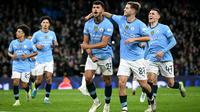 Gelandang Manchester City asal Portugal #27, Matheus Nunes (C), merayakan gol kelima tim saat pertandingan Liga Champions UEFA antara Manchester City dan Sparta Prague di Stadion Etihad di Manchester, barat laut Inggris, Kamis dini hari WIB (24/10/2024). (Oli SCARFF/AFP)