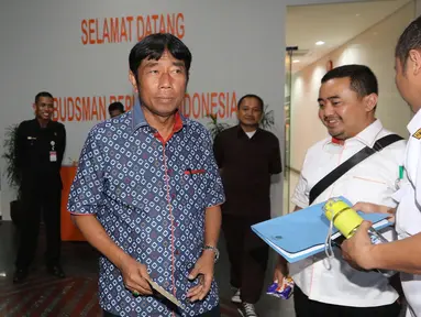 Anggota DPRD DKI Jakarta Abraham Lunggana (Haji Lulung) usai diperiksa penyidik Direktorat Tindak Pidana Korupsi Bareskrim Polri di Ombudsman, Jakarta, Rabu (12/4). (Liputan6.com/Helmi Afandi) 