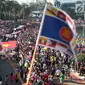 Suasana kemeriahan parade ASEAN 50 Tahun di Jakarta, Minggu (27/8). Acara ini menampilkan Parade Bendera ASEAN, Parade kostum, Parade tari musik, dan keunikan lainnya. (Liputan6.com/Angga Yuniar)