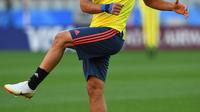 Penyerang Kolombia, Radamel Falcao melakukan pemanasan saat mengikuti latihan di Stadion Spartak di Moskow, Rusia(2/7). Kolombia akan bertanding melawan Inggris pada babak 16 besar Piala Dunia 2018. (AFP Photo/Francisco Leong)