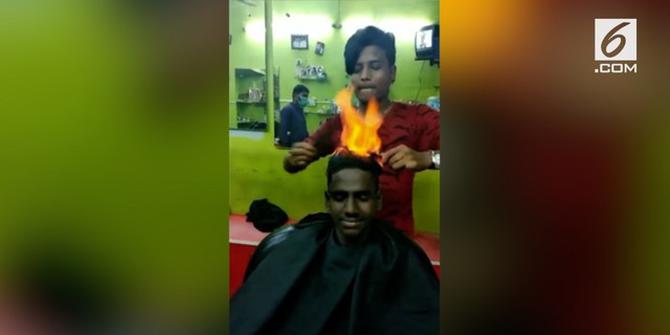 VIDEO: Sensasi Cukur Rambut dengan Api di India