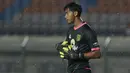 Satria Tama - Penjaga gawang yang baru direkrut Bajul Ijo ini langsung menunjukan kualitasnya dan menjadi andalan di bawah mistar gawang. Sebelumnya, kiper kelahiran Sidoarjo ini pernah ditempa di Persebaya Junior. (Bola.com/M Iqbal Ichsan)