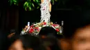 Sebelumnya, umat Kristiani juga menjalani ibadah misa Tri Hari Suci jelang perayaan Paskah 2024. (Ishara S. KODIKARA/AFP)