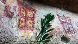 Lukisan di dinding batu cadas Gua Taira Calama, Chile, Minggu (21/7). Gua Taira Calama terletak di ketinggian 3.150 meter. (Martin Bernetti/AFP)
