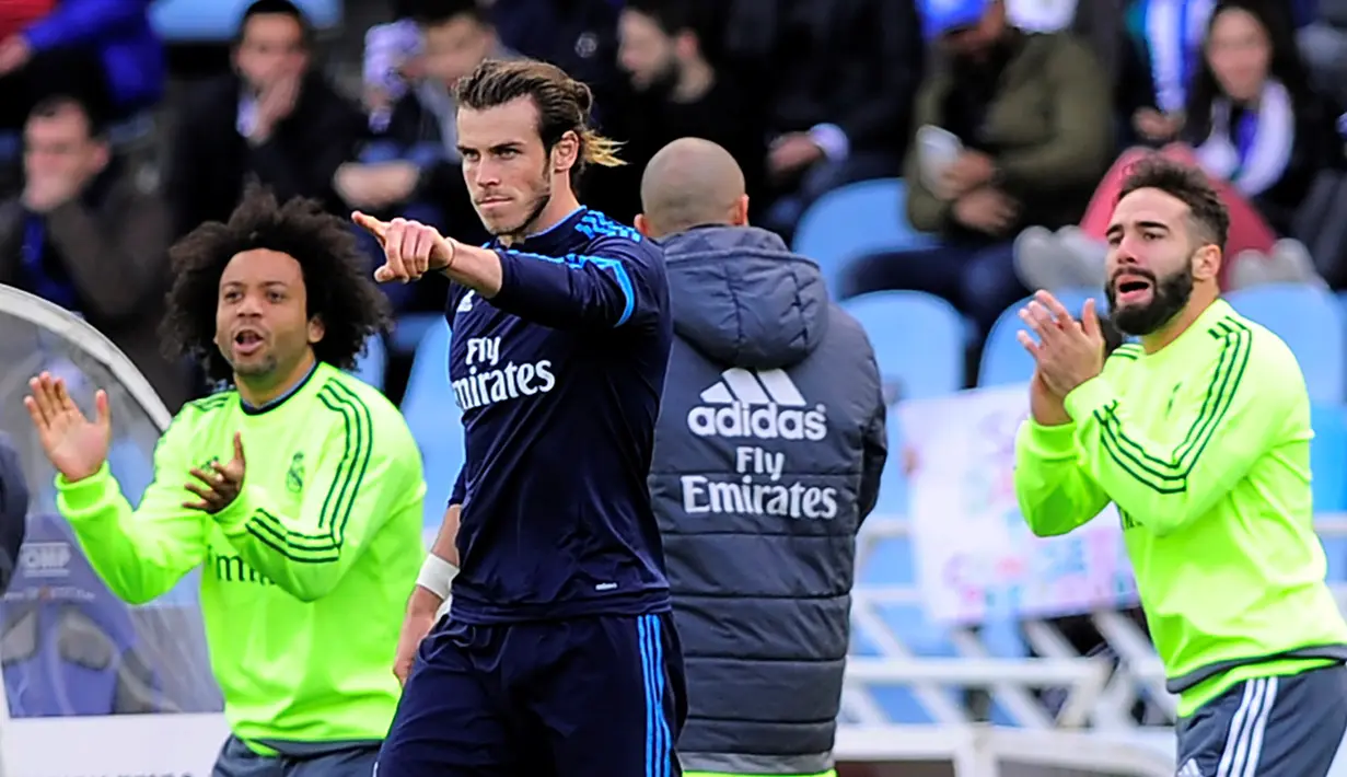 Real Madrid meraih kemenangan 1-0 atas Real Sociedad dalam laga pekan ke-36 La Liga Spanyol di Stadion Anoeta, Sabtu (30/4/2016) malam WIB. Gol tunggal Los Blancos dicetak Gareth Bale pada menit ke-80. (AFP/Ander Gillenea)