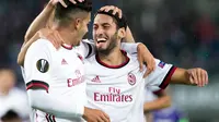 Hakan Calhanoglu yakin pada gaya melatih Montella di AC Milan. (AFP / GEORG HOCHMUTH / APA)