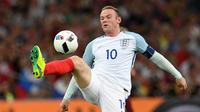 Wayne Rooney. Striker Inggris ini mengoleksi 6 gol dalam 3 edisi Piala Eropa, yaitu Euro 2004, 2012 dan 2016. Pencapaian terbaiknya adalah lolos hingga perempatfinal di edisi 2004 dan 2012. Wayne Rooney memutuskan pensiun pada 15 November 2018 dengan koleksi 120 caps. (Foto: AFP/Paul Ellis)