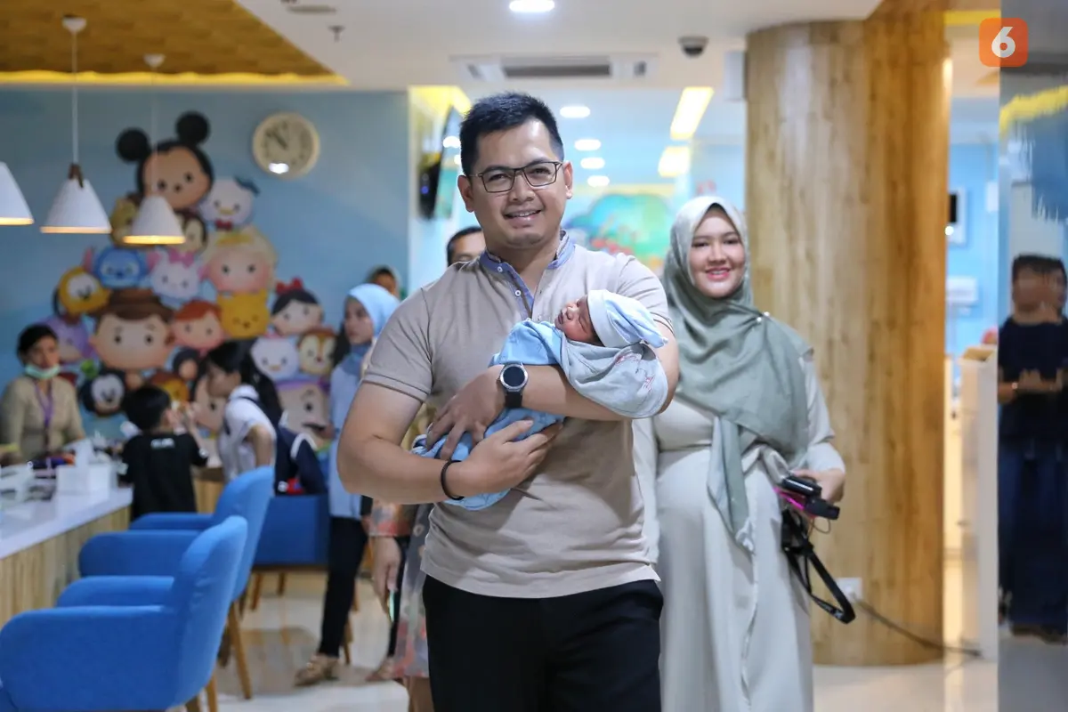 [Fimela] Tommy Kurniawan dan Lisya Nurrahmi