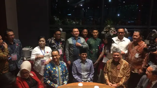 Gubernur dan Wagub DKI, Anies Baswedan-Sandiaga Uno, hadiri perayaan Natal bersama Pemprov DKI.