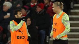 Manchester City menurunkan banyak pemain pelapis sebagai starter di semua posisi, termasuk di posisi striker tak ada nama Erling Haaland. (AFP/Adrian Dennis)