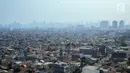 Pemandangan pemukiman penduduk dan gedung bertingkat di Jakarta, Senin (23/9/2019). Economist Intelligence Unit (EIU) merilis Global Liveability Report 2019 yang menempatkan Jakarta pada posisi ke-115 dari 140 kota layak huni di dunia. (Liputan6.com/Faizal Fanani)