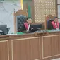 Tersangka Rizky Noviandi Ahmad saat menjalani sidang putusan hukuman mati di Pengadilan Negeri Depok. (Liputan6.com/Dicky Agung Prihanto)