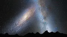 Ilustrasi Andromeda dan Galaksi Bima Sakti di langit malam (NASA)
