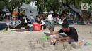 Kawasan wisata Ancol, Jakarta Utara, mulai dipadati pengunjung pada hari kedua Lebaran 2025. (Liputan6.com/Herman Zakharia)