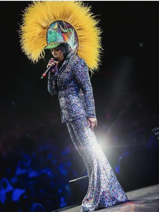 Melly Goeslaw saat Konser di Malaysia, credit: @nasikilla