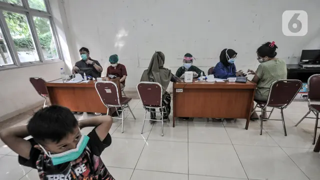 FOTO: Sembako Gratis untuk Peserta Vaksinasi COVID-19