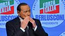 Silvio Berlusconi merupakan salah satu tokoh terkemuka di Italia. Tak hanya aktif di sepak bola, pria kelahiran 29 September 1936 ini juga dikenal sebagai politikus. (AFP/Filippo Monteforte)