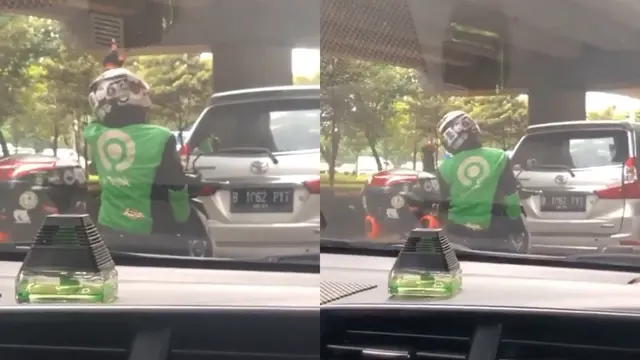 Usir Bosan di Lampu Merah, Driver Ojol Ini Asyik Joget di Atas Motor