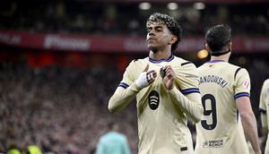 Penyerang Barcelona, Lamine Yamal, merayakan gol yang dicetaknya ke gawang Athletic Club dalam laga jornada 27 La Liga Spanyol 2025/2026 di San Mames Stadium, Bilbao, Minggu (8/3/2026) dini hari WIB. (ANDER GILLENEA / AFP)