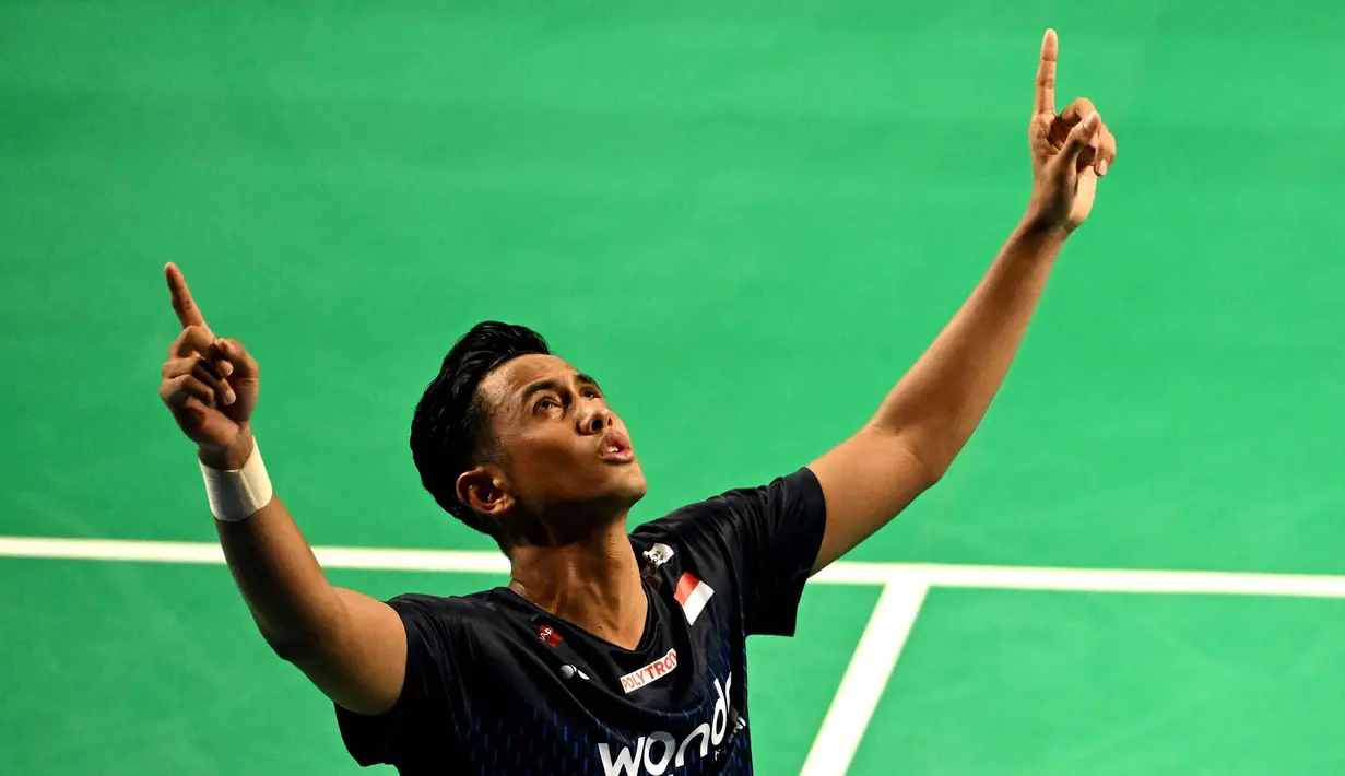 Ekspresi tunggal putra Indonesia, Alwi Farhan, merayakan setelah mengalahkan Dong Tian Yao (Tiongkok) di final tunggal putra turnamen bulu tangkis Australia Open 2026, Sydney, pada Minggu 14 Juni 2026. (Saeed KHAN/AFP)