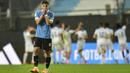 <p>Perolehan poin Uruguay sama dengan Tunisia yang berada di posisi ketiga usai menang 3-0 atas Irak. Namun, Tunisia kalah selisih gol dari Uruguay. (AP Photo/Gustavo Garello)</p>
