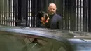 Tiba di Pengadilan Assize, Paris, Prancis pada 13 Mei 2025, Kim Kardashian akan memberi kesaksian langsung di hadapan pengadilan terkait kasus perampokan yang menimpanya di Paris pada 2016 lalu. (Thomas SAMSON/AFP)