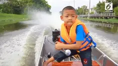 Keahlian bocah asal Thailand ini patut diacungi jempol. Meski usianya masih 5 tahun, ia mampu mengemudikan perahu.