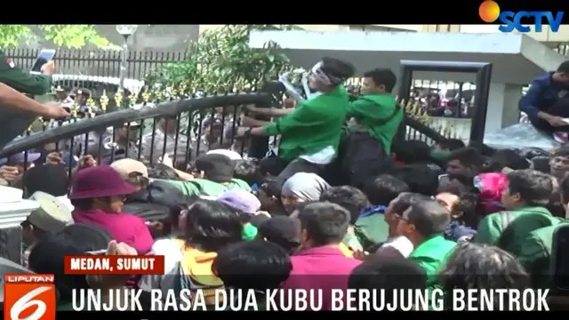 Bentrokan yang terjadi di depan Gedung DPRD Sumatera Utara ini bermula dari aksi saling ejek antara kedua kubu.