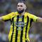 Pemain depan Ittihad asal Prancis bernomor punggung 09, Karim Benzema, merayakan golnya selama pertandingan Liga Pro Saudi antara Al-Ittihad dan Al-Nassr di King Abdullah Sports City di Jeddah pada tanggal 6 Desember 2024. (AFP)