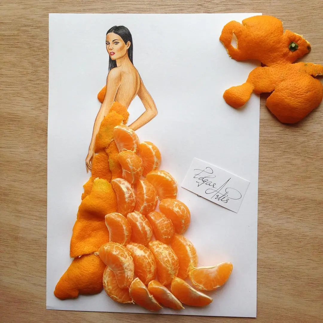 Warna orange pada buah jeruk bikin gaun eye catching (sumber foto: @edgar_artis/instagram)