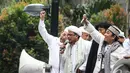 Habib Rizieq bersama Gerakan Masyarakat Jakarta (GMJ) berunjukrasa menolak Basuki Tjahaja  Purnama alias Ahok menjadi Gubernur DKI Jakarta, Jakarta, Senin (10/11/2014)   (Liputan6.com/Faizal Fanani)