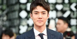 Tak hanya tampan, Sehun EXO ternyata juga punya hati emas. Lantaran ia kerap meluangkan waktunya untuk kegiatan sosial di sela-sela jadwalnya yang padat di dunia hiburan. (Foto: Soompi.com)