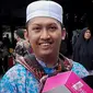 Nakata Firdaus Abdullah (18) merupakan calon jemaah haji termuda asal Solo. Ia berangkat haji untuk menggantinya ibunya yang meninggal dunia pada 2020 lalu.(Liputan6.com/Fajar Abrori)