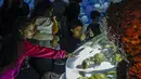 Anak-anak saat mengunjungi pameran "Keindahan Bawah Laut" (Underwater Beauty) di Shedd Aquarium di Chicago, Amerika Serikat (17/2/2020). Shedd Aquarium  memiliki koleksi 32.000 ekor binatang dan menarik sekitar 2 juta pengunjung setiap tahun. (Xinhua/Joel Lerner)