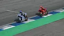Pada sprint race dan balapan utama di Sirkuit Buriram, Thailand, Marc Marquez menduduki podium tertinggi sehingga membawa pulang 37 angka. (MOHD RASFAN/AFP)