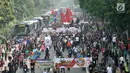 Suasana kemeriahan saat pawai Deklarasi Kampanye Damai di Monas, Minggu (23/9). Pawai dimulai dari Monas kemudian melintasi Jalan Medan Merdeka Barat dan kembali ke Monas. (Merdeka.com/Iqbal Nugroho)