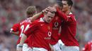 Gol pertama Wayne Rooney dalam Derbi Manchester terjadi pada musim debutnya pada 2004/2005, tepatnya pada pekan ke-27 Liga Inggris, 13 Februari 2005. Saat itu MU yang bertandang ke markas Manchester City berhasil menang dengan skor 2-0 dan Wayne Rooney mencetak gol pertama pada menit ke-68. Sementara gol kedua lahir dari bunuh diri pemain Manchester City Richard Dunne pada menit ke-75. (AFP/Paul Barker)